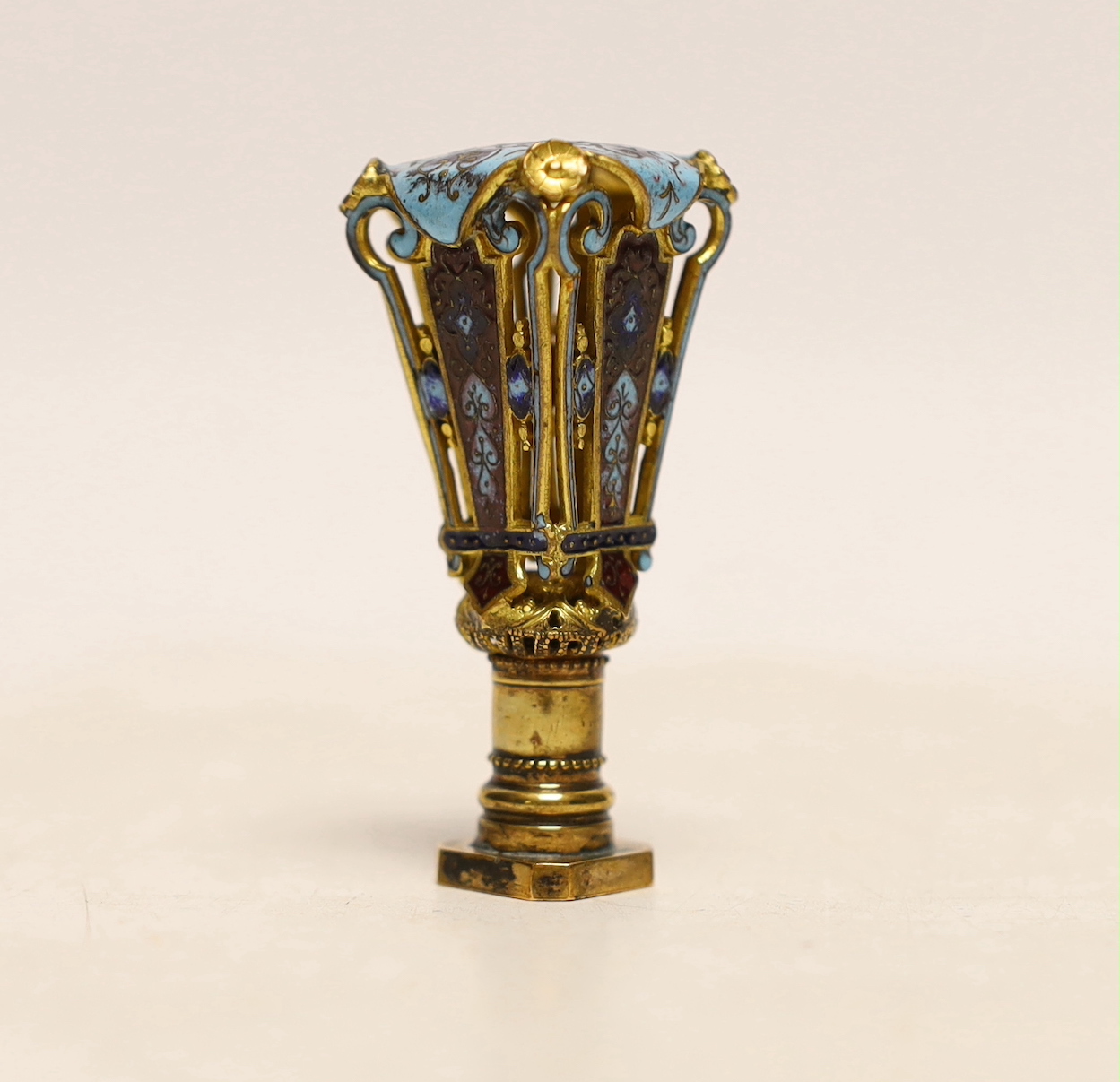 A late 19th century French cased gilt metal and champleve enamel desk seal, 5.5cm high